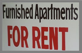 black white and red furnished apartments for rent sign